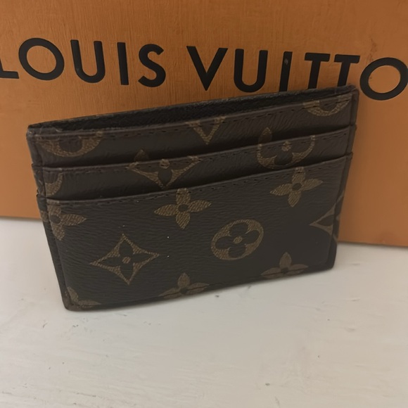 Louis Vuitton leather mini pouch with Gold raised LV - Picture 3 of 4